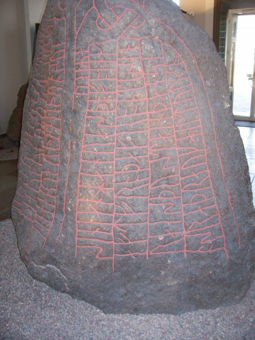 A runestone!  This was written 1000s of years ago.  I want to commemorate the death of a loved one by chiselling archaic lettering into a giant rock.  